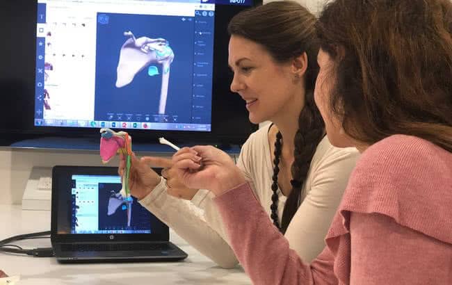 Victoria University students working with 3D printed bones.