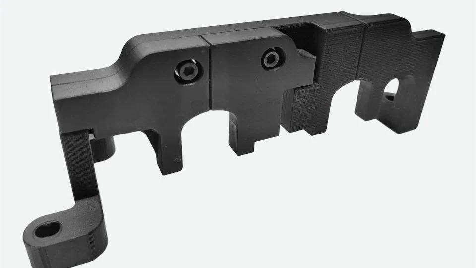 3D printed camshaft locking tool designed and used by Punch Torino on a Markforged X7 Industrial 3d printer